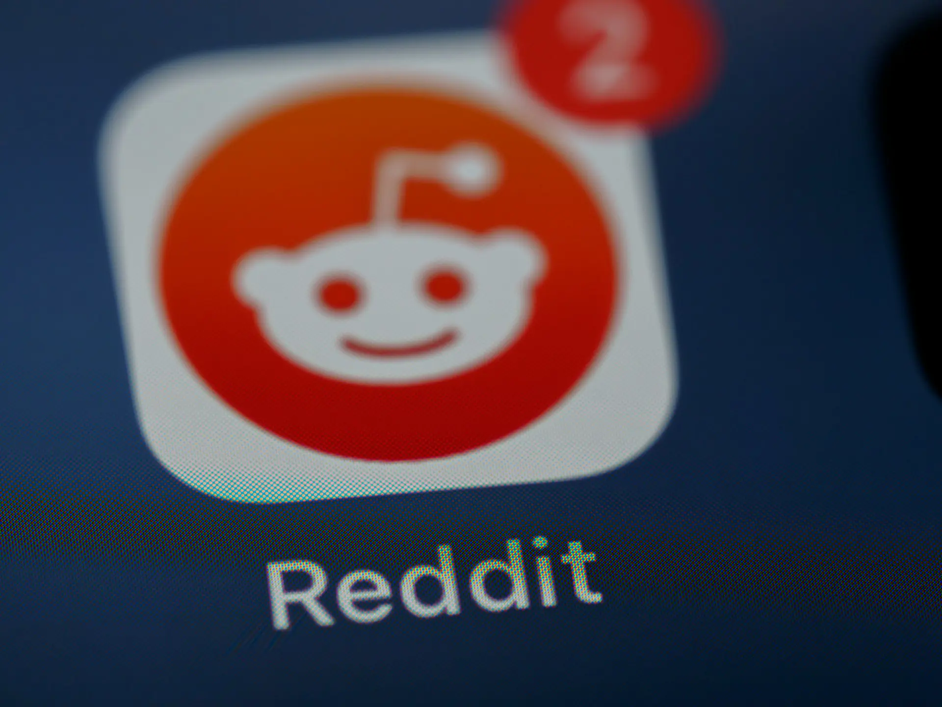 reddit-ads-reddit-app-on-phone-screen-with-notification-alert.jpg
